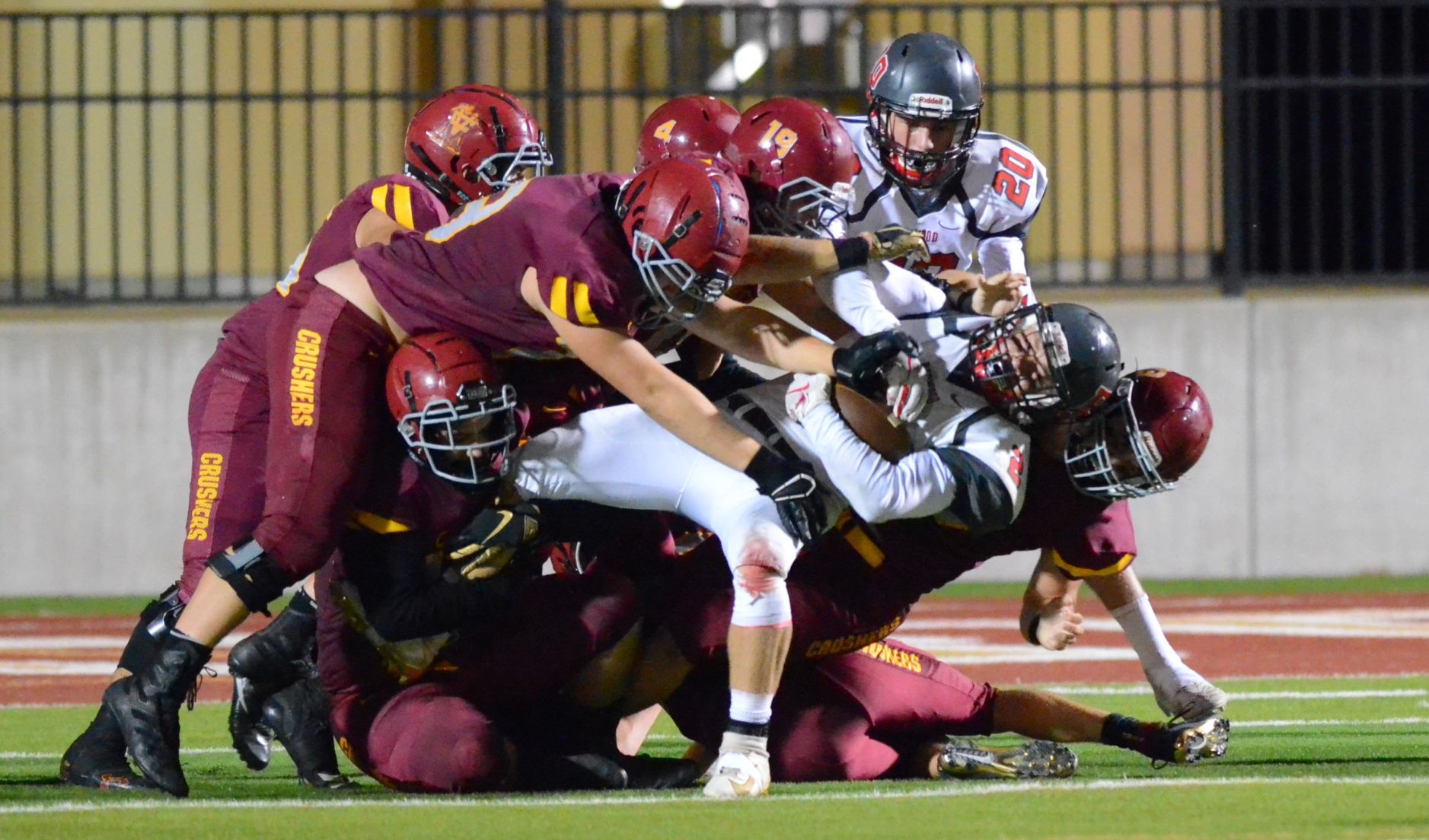 Vintage football vs. Redwood